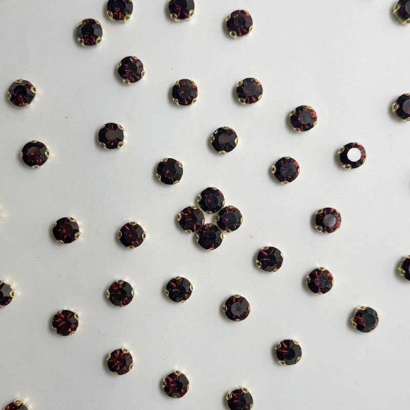 Maroon Round Crystal with Gold Claw Setting