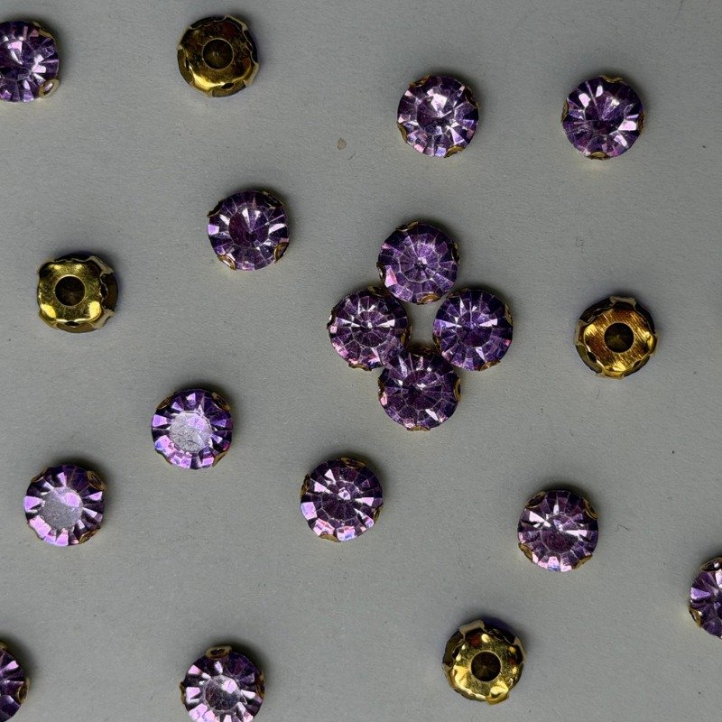 Purple Round Crystal with Gold Claw Setting